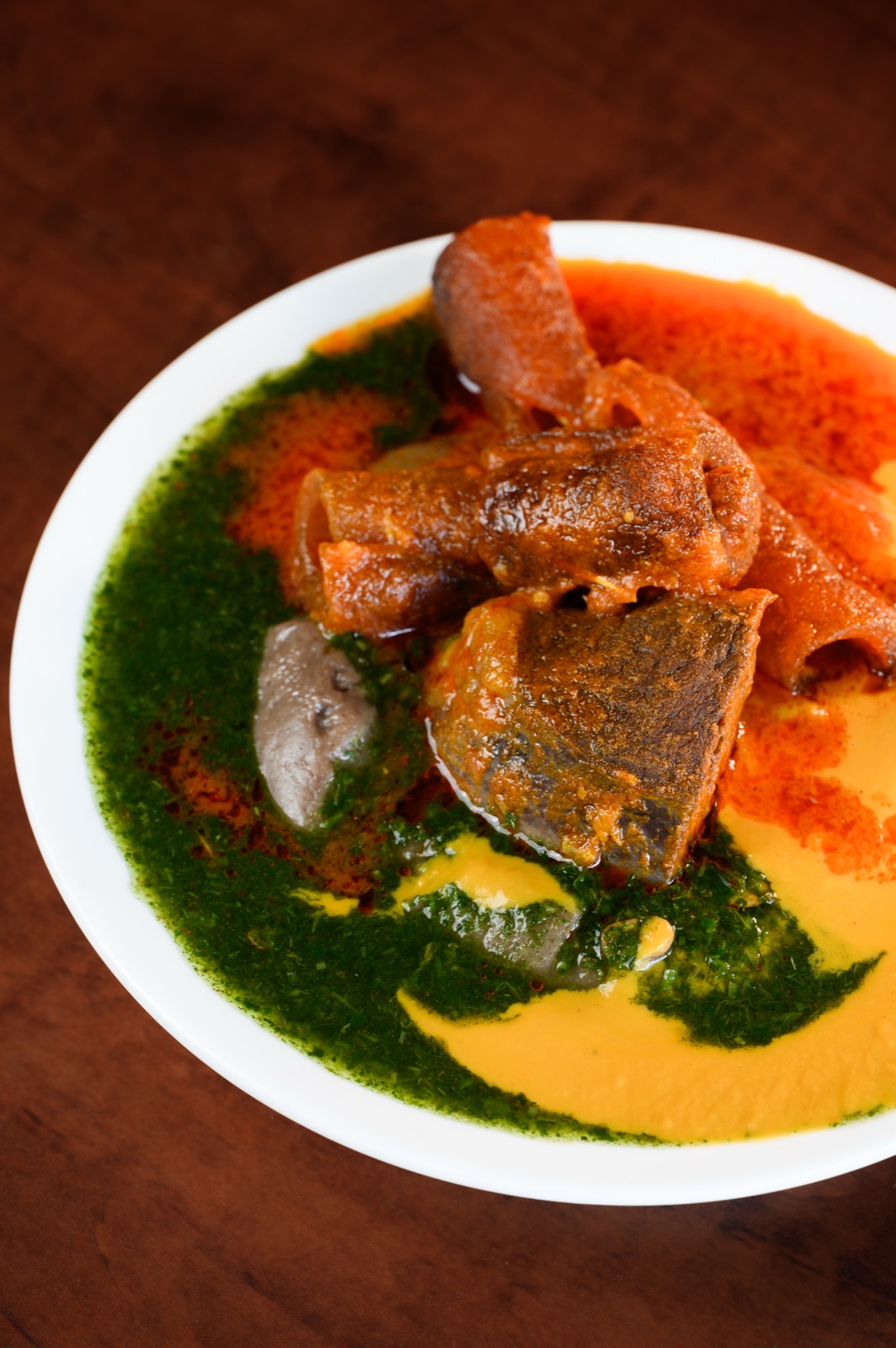 Abula — gbegiri, ewedu and rich red stew in one bowl.