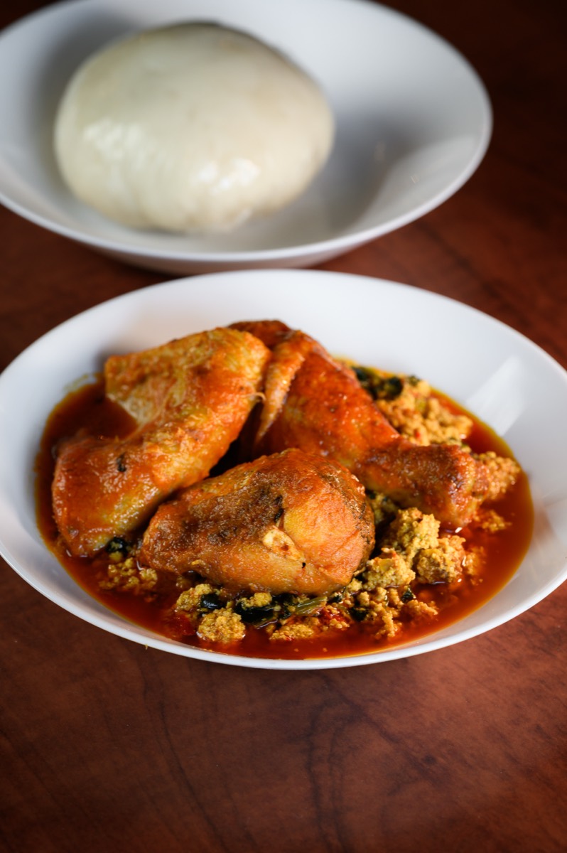 Egusi stew with chicken and pounded yam.